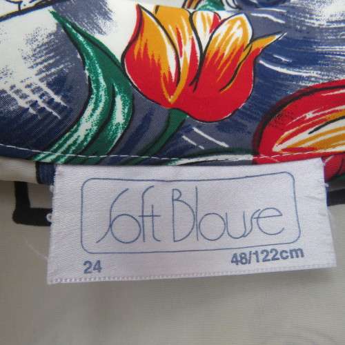 NOTICE ME short sleeve top with button down front. Size 48/24 by SOFT BLOUSE. In 100% polyester.