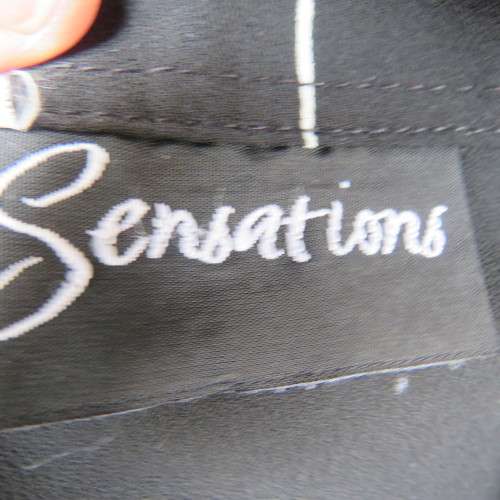 Beautiful black long tailored top with white graphic print by SENSATIONS in size 34/10. As new.