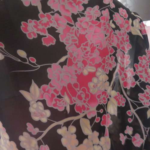 Fabulous black sheer polyester top with pink/cream posies.Size 32/8 by WOOLWORTHS.As new.