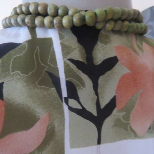 Pattern blocked cream top with green and peach flowers.Collarless with V. Size 42/18 by CHARLOTTE