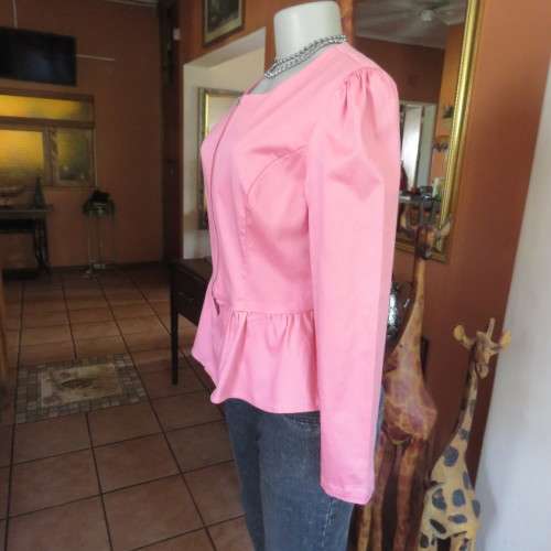 Peplum zip-up long sleeve stretch cotton top in salmon pink. Size 34 loose. 36 tight. By RT.As new