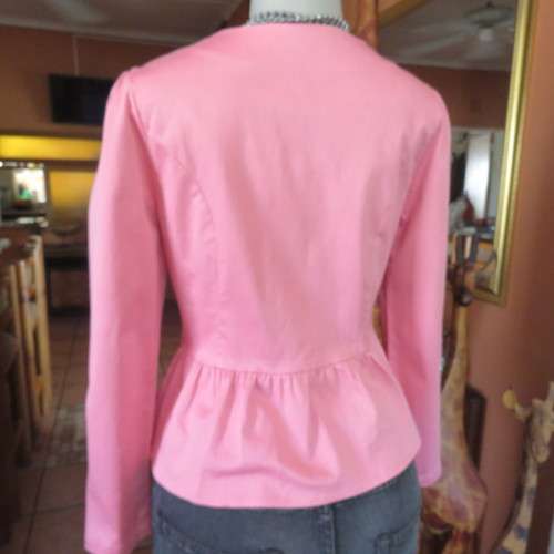 Peplum zip-up long sleeve stretch cotton top in salmon pink. Size 34 loose. 36 tight. By RT.As new