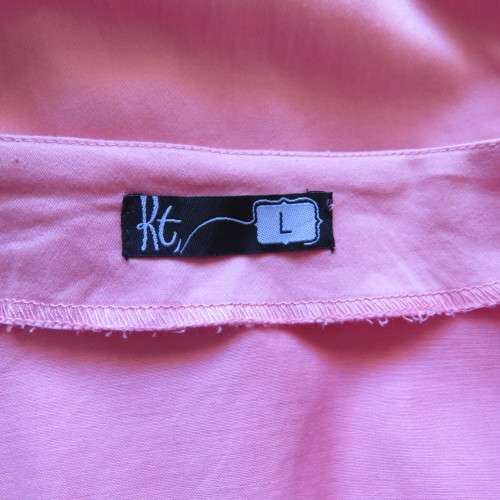 Peplum zip-up long sleeve stretch cotton top in salmon pink. Size 34 loose. 36 tight. By RT.As new