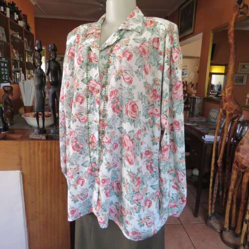 Silky boutique made pink/crimson floral long sleeve top on cream. Gathering on shoulders. Size 50/26