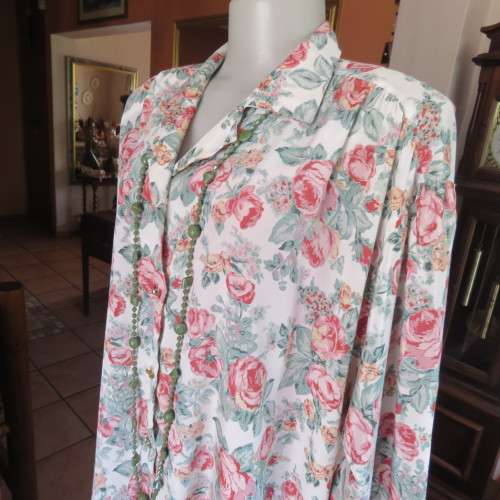 Silky boutique made pink/crimson floral long sleeve top on cream. Gathering on shoulders. Size 50/26