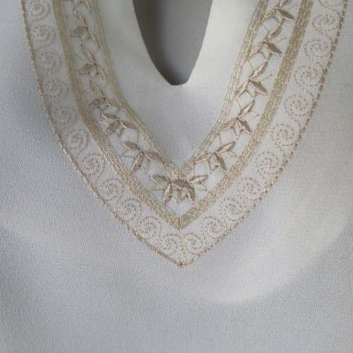 Stylish rich cream slip over long sleeve top size 38/14 with pretty embroidered neckline.By STATURE.