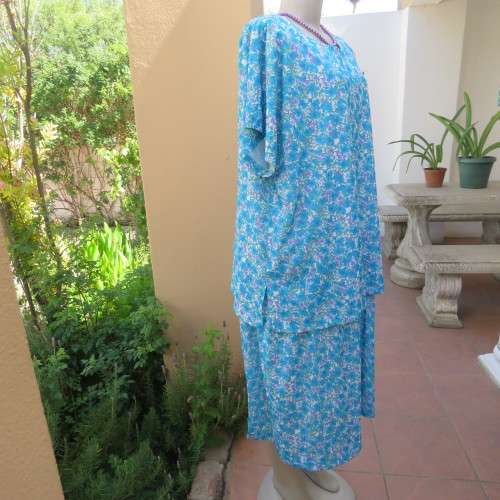 Smart vintage floral dress in cool blue and green colours.Overlay top. By TORY FASHIONS.By 48/24