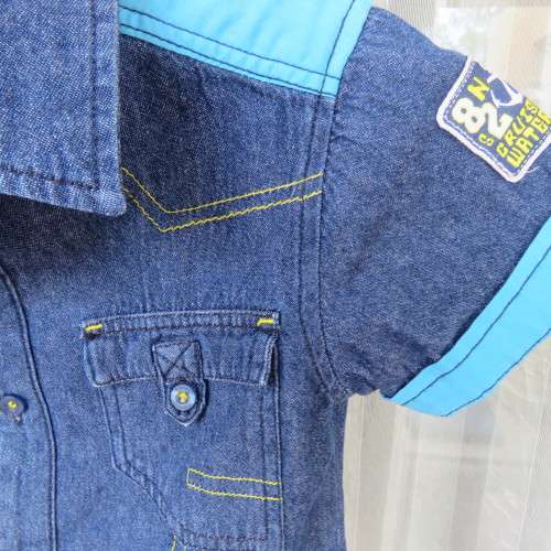 Handsome little short sleeve denim shirt for 5 to 6 yr old boy.Chest 66cm. 2 front pockets.As New