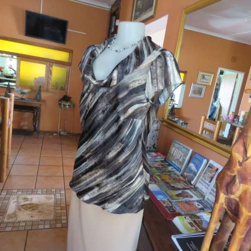 Glamour capped sleeve top with diagonal stripes in black,beige and brown with gold thread.Size 36/12