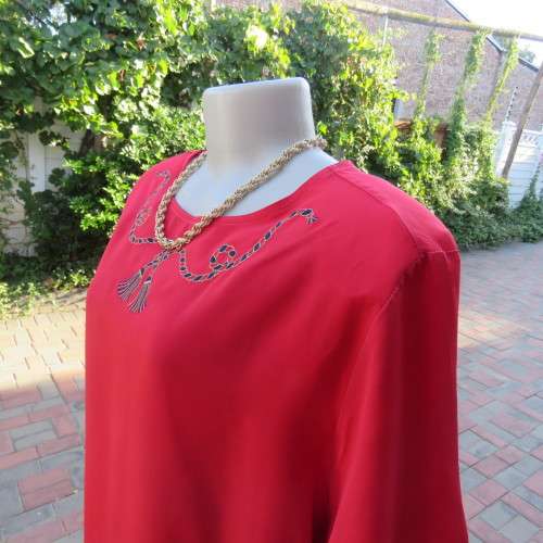 Cherry red slip over silky 100% polyester short sleeve top with stunning embroidery.Size 48.As new