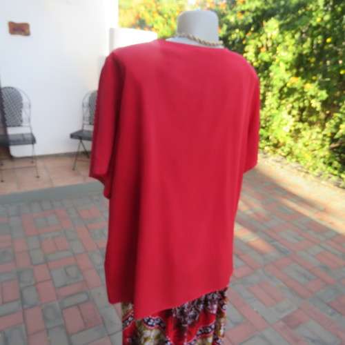 Cherry red slip over silky 100% polyester short sleeve top with stunning embroidery.Size 48.As new