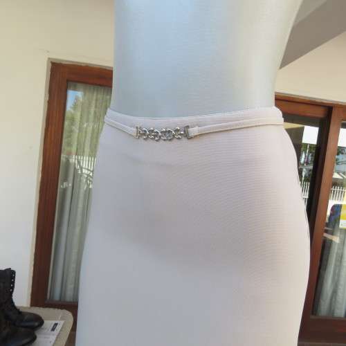 Elegant beige ankle length pencil skirt. Bandless with zip and pleat at back. Size 32/8.Good cond.