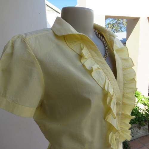 Feminine lemon yellow button down capped sleeve top with frilled front.Open round end collar.Size 38