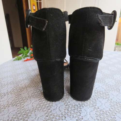 As new black block heel suede shoes with ankle straps and open toes. By MRP in size 3
