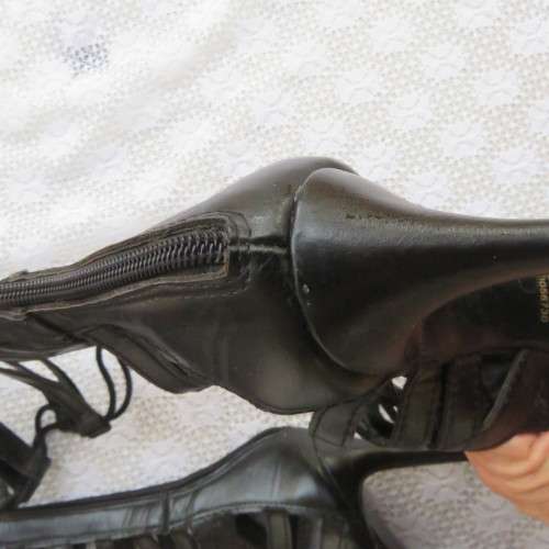 As new knee high lace up stilettos in black. Zip at back.By Boity x LEGIT size 7.