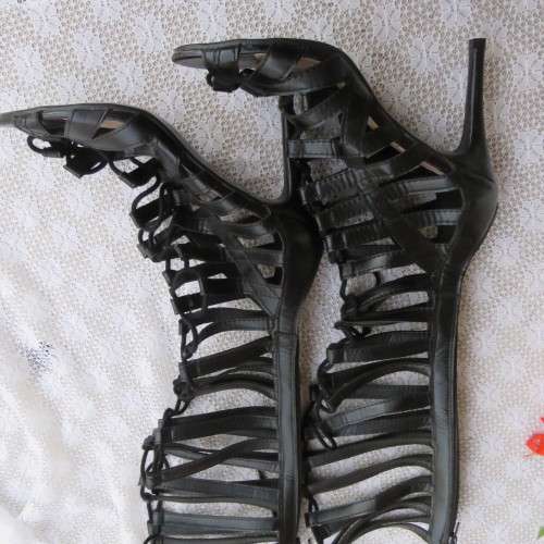 As new knee high lace up stilettos in black. Zip at back.By Boity x LEGIT size 7.