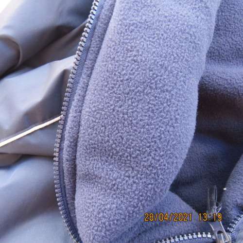 Zippered navy size XL hooded jacket.Outer in water resistant polyester.Inner fleece polyester.As new