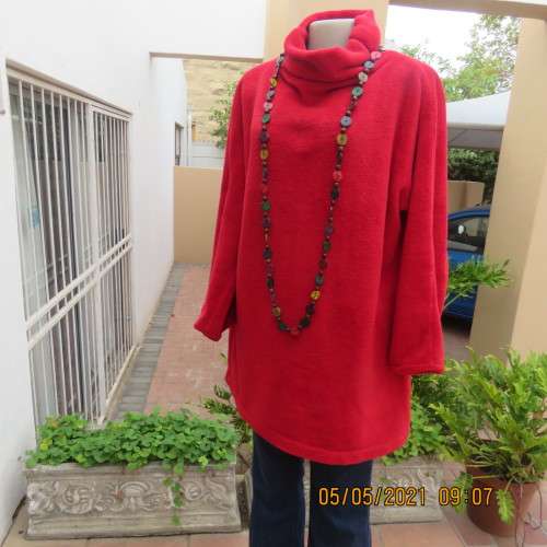 Warm red polyester fleeze long sleeve top with polo neck. Owner made size 44/20.As new