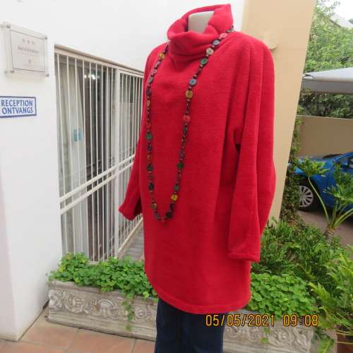 Warm red polyester fleeze long sleeve top with polo neck. Owner made size 44/20.As new