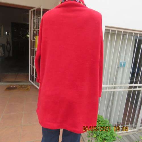 Warm red polyester fleeze long sleeve top with polo neck. Owner made size 44/20.As new