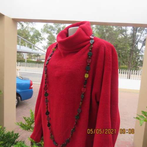 Warm red polyester fleeze long sleeve top with polo neck. Owner made size 44/20.As new