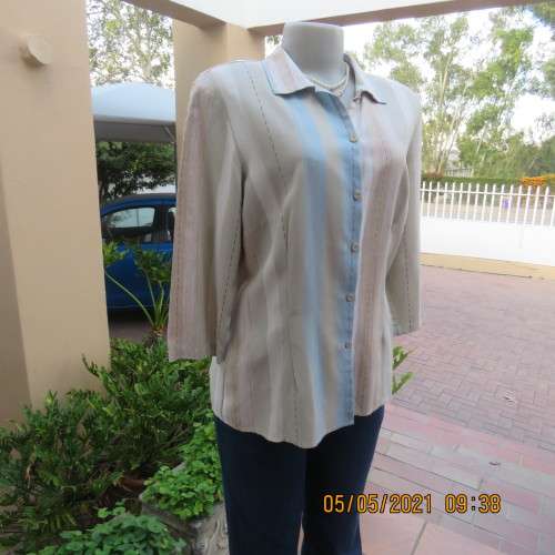 Stunning tasteful printed top in vertical blue and natural colour stripes.Size 36/12.By BASICS.
