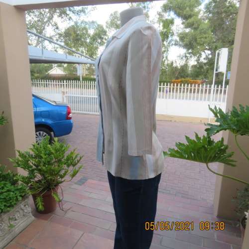 Stunning tasteful printed top in vertical blue and natural colour stripes.Size 36/12.By BASICS.
