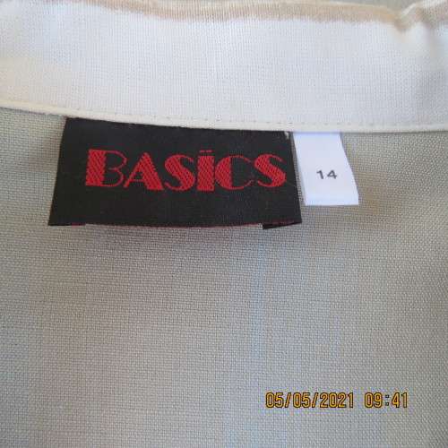 Stunning tasteful printed top in vertical blue and natural colour stripes.Size 36/12.By BASICS.