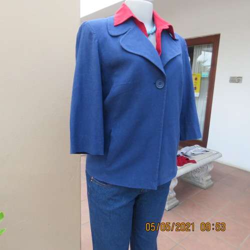 Flattering indigo blue open jacket in linen/rayon blend.One button. Size 34/10 by WOOLWORTHS.As new