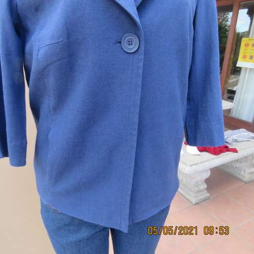Flattering indigo blue open jacket in linen/rayon blend.One button. Size 34/10 by WOOLWORTHS.As new