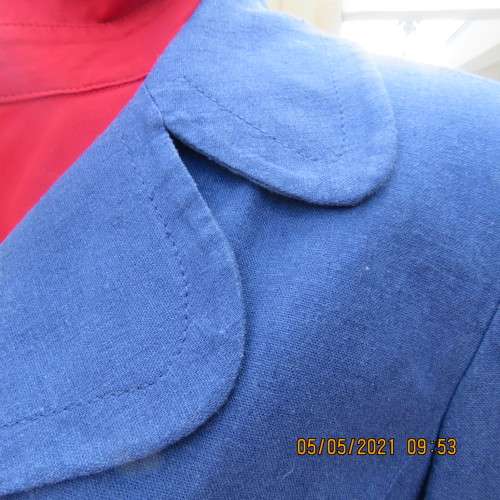 Flattering indigo blue open jacket in linen/rayon blend.One button. Size 34/10 by WOOLWORTHS.As new
