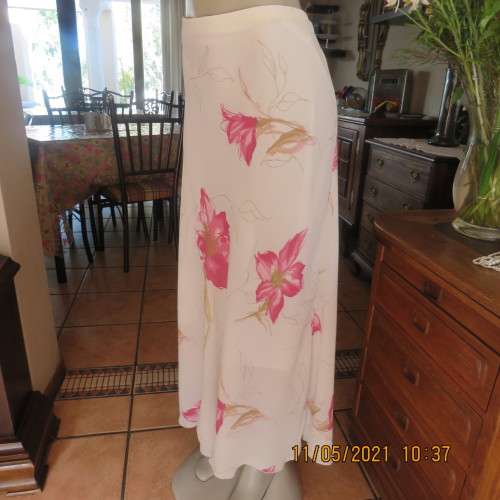 Timeless cream sheer polyester straight maxi skirt with bold pink flowers Size 48/24.As new
