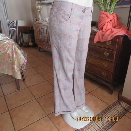 Easy to wear low rise check bootcut pants in poly/rayon stretch. By INSTINCT size 36 to 38.As new