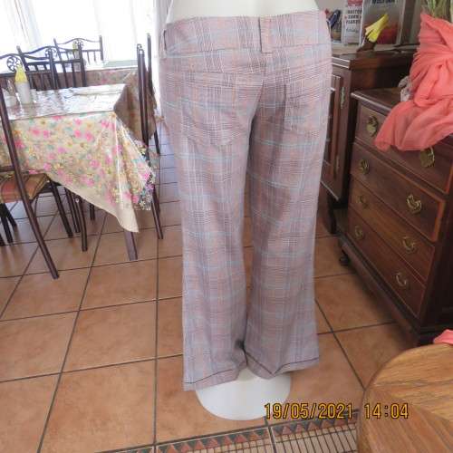 Easy to wear low rise check bootcut pants in poly/rayon stretch. By INSTINCT size 36 to 38.As new