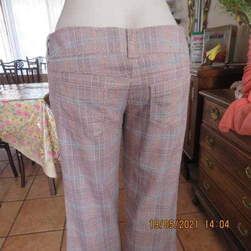 Easy to wear low rise check bootcut pants in poly/rayon stretch. By INSTINCT size 36 to 38.As new