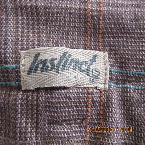 Easy to wear low rise check bootcut pants in poly/rayon stretch. By INSTINCT size 36 to 38.As new