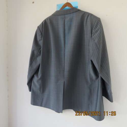 Handsome Men`s silvergrey pinstripe jacket in size 42.Used once. Washable.Pockets front and inside.