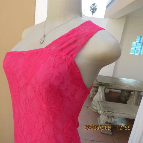 Seriously sexy pink one shoulder acrylic lace dress with stretch polyester inner. Size 34 to 36.