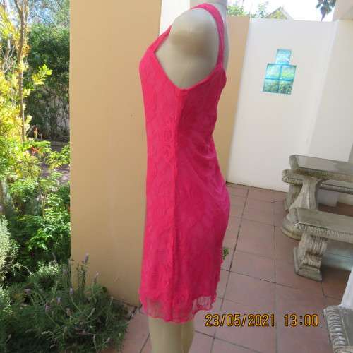 Seriously sexy pink one shoulder acrylic lace dress with stretch polyester inner. Size 34 to 36.