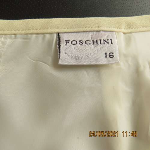 Daffodil yellow knee length fully lined pencil skirt by FOSHINI in size 40/16. Zip at back.As new.