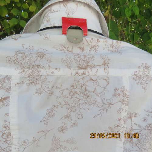High class white stretch cotton long sleeve shirt with brown floral design.Size 34/10 by TRUWORTHS.