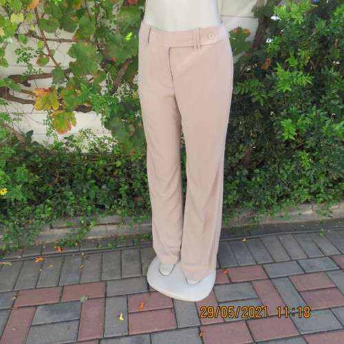 Elegant latte beige pants from WOOLWORTHS size 34/10 with space.Straight legs.Good condition.