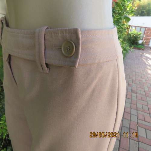 Elegant latte beige pants from WOOLWORTHS size 34/10 with space.Straight legs.Good condition.