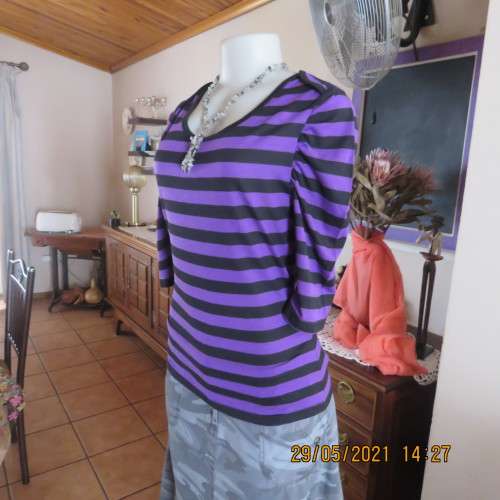 Cute purple and black horizontal striped slip over top in poly/viscose blend. Size 34 by LEGIT