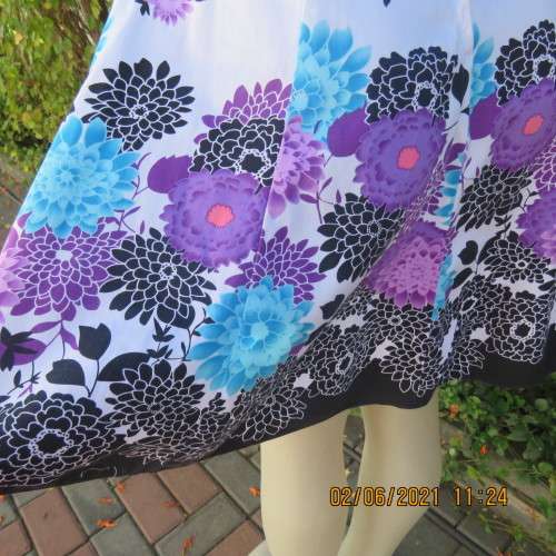 Summer dream dress by INWEAR size 34/10.Strapless with empire waist in white with purple.turquoise.