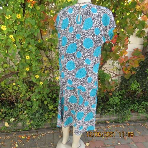 Smart monochrome dress with turquoise flower posies. Size 38/14 by STUDIO 1 N Y.Overlay top.As new.