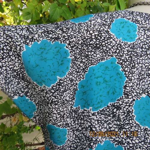Smart monochrome dress with turquoise flower posies. Size 38/14 by STUDIO 1 N Y.Overlay top.As new.