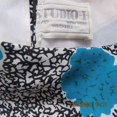 Smart monochrome dress with turquoise flower posies. Size 38/14 by STUDIO 1 N Y.Overlay top.As new.
