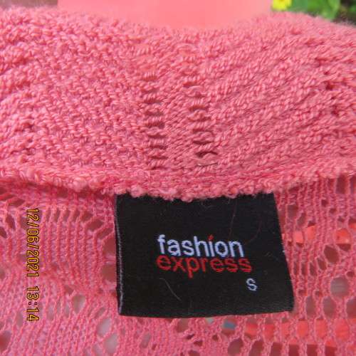 Lovely coral colour capped sleeve bolero in stretch acrylic lace. Size 34/10 by FASHION EXPRESS.