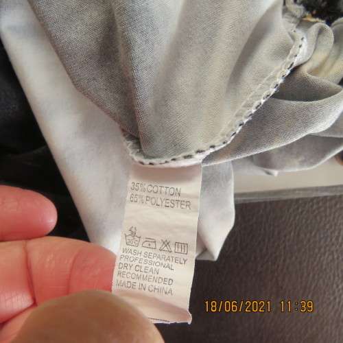 Snappy tie dye pattern black/white/mustard ankle length stretch polycotton skirt,Size 32 to 34.